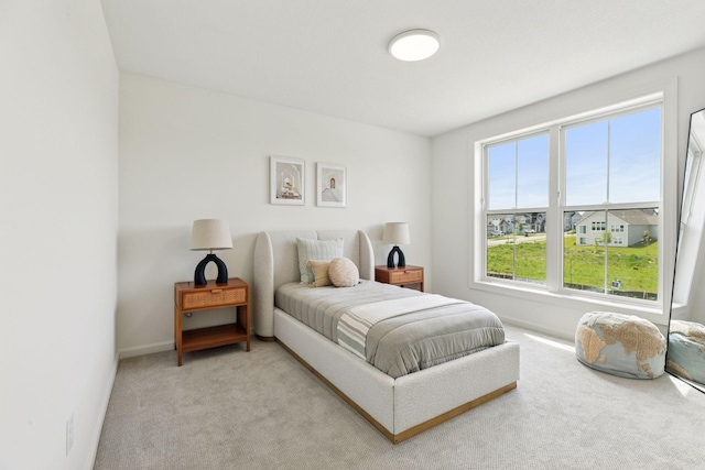 10172 Peony Ln N, Maple Grove, MN 55311 - bedroom featuring light colored carpet and baseboards
