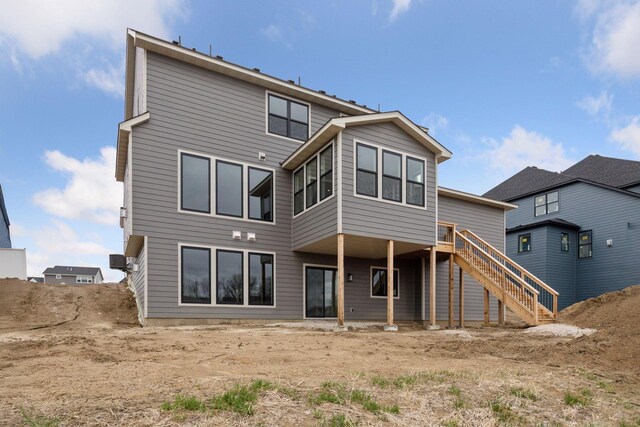 10172 Peony Ln N, Maple Grove, MN 55311 - back of house with stairway