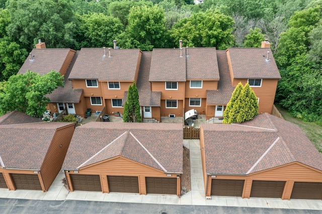 1626 Raindrop Dr, Eagan, MN 55121 - aerial view of property and surrounding area featuring a forest