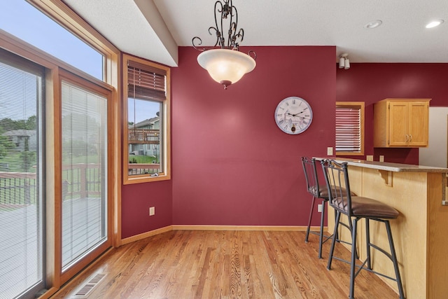 20886 Jenkins Way, Lakeville, MN 55044 - dining space with light wood-style floors and recessed lighting