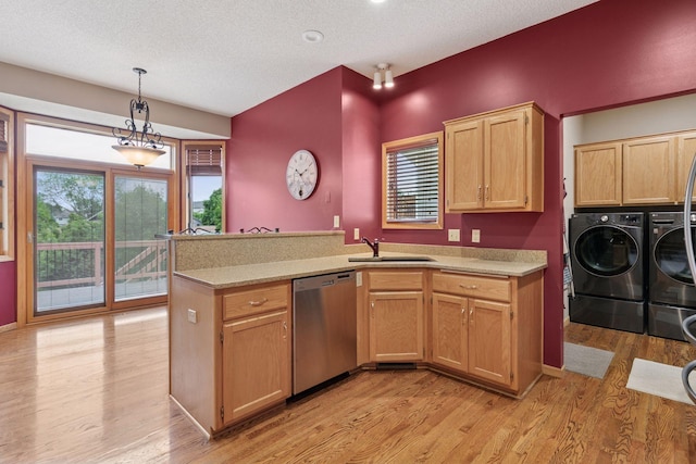 20886 Jenkins Way, Lakeville, MN 55044 - kitchen featuring dishwasher, washer and dryer, light wood-type flooring, light countertops, and a textured ceiling