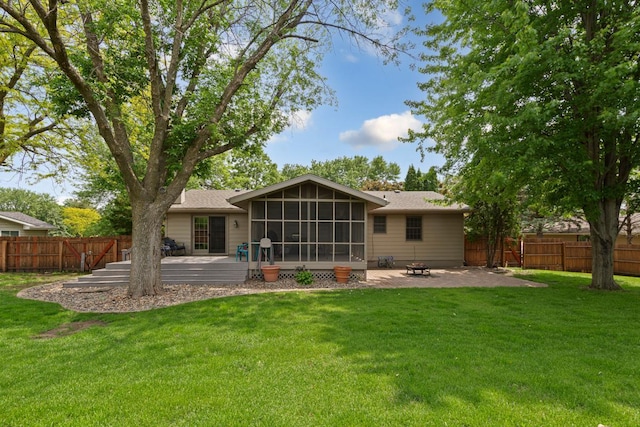 432 Garden Rd, Albert Lea, MN 56007 - rear view of property featuring a sunroom, a patio area, a deck, and an outdoor fire pit