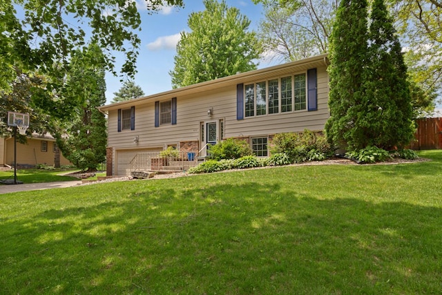 432 Garden Rd, Albert Lea, MN 56007 - bi-level home featuring an attached garage, brick siding, and driveway