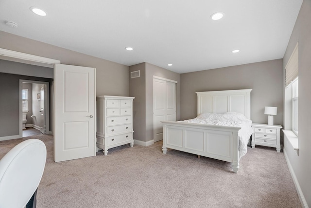 1270 Crosswinds Ct, Waconia, MN 55387 - bedroom featuring light carpet, baseboards, a closet, and recessed lighting