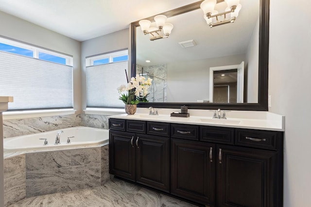 1270 Crosswinds Ct, Waconia, MN 55387 - bathroom featuring double vanity and a garden tub