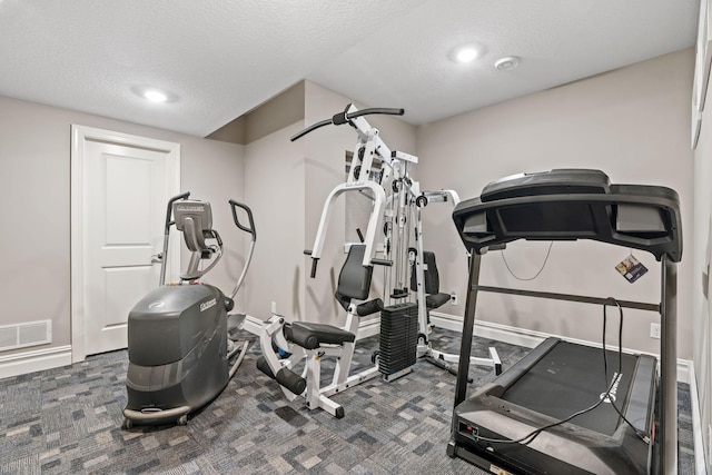 1270 Crosswinds Ct, Waconia, MN 55387 - workout area featuring carpet flooring, a textured ceiling, and recessed lighting