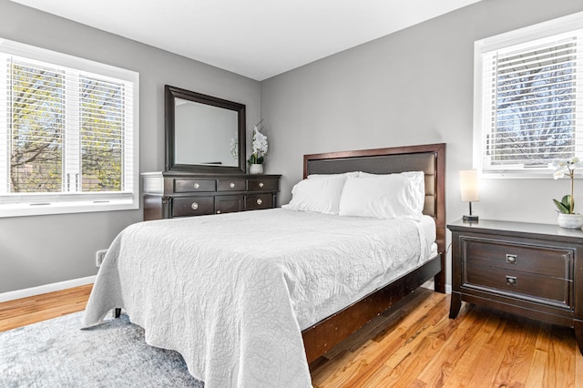 7136 145th St W, Apple Valley, MN 55124 - bedroom featuring wood finished floors and baseboards