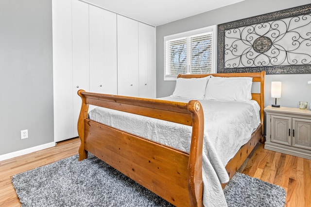7136 145th St W, Apple Valley, MN 55124 - bedroom with wood finished floors and baseboards
