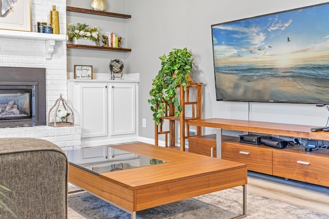 7136 145th St W, Apple Valley, MN 55124 - living room with light wood-type flooring and a brick fireplace