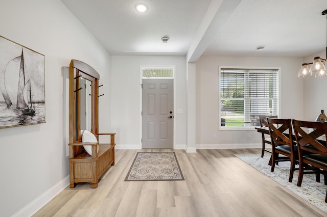 9867 Kahler Ave NE, Monticello, MN 55362 - foyer featuring light wood finished floors, baseboards, and recessed lighting