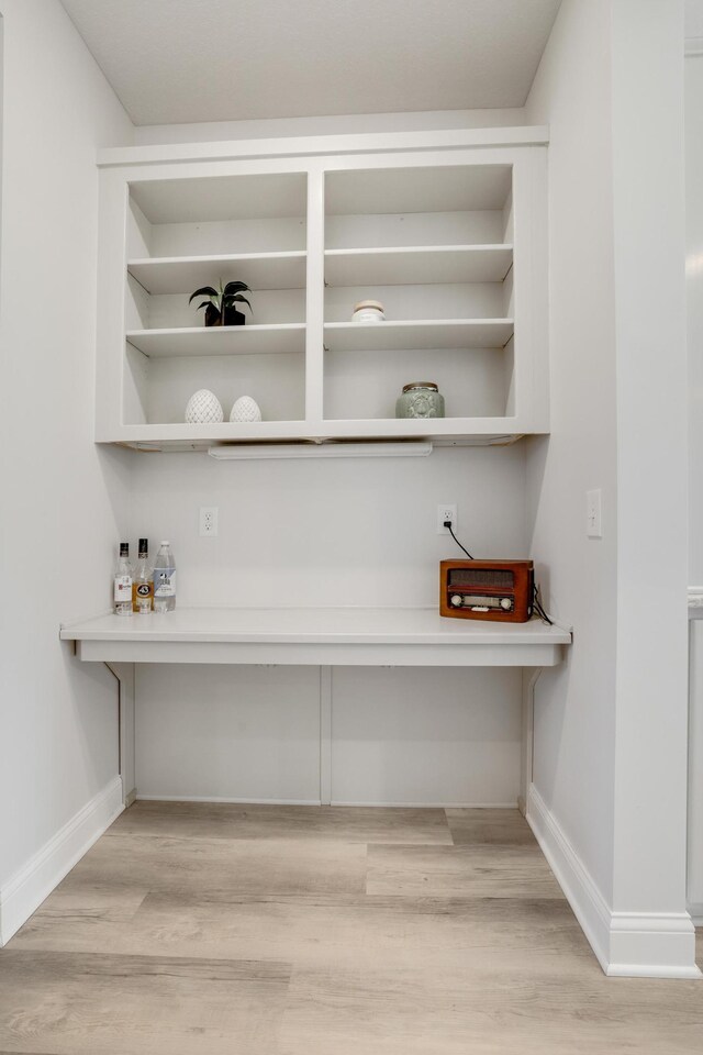 9867 Kahler Ave NE, Monticello, MN 55362 - detailed view of wood finished floors and baseboards