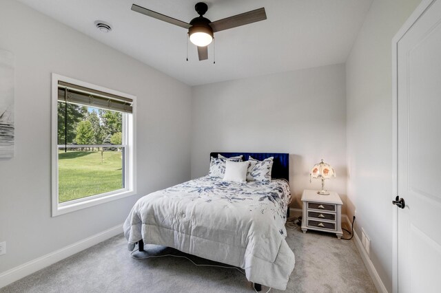 9867 Kahler Ave NE, Monticello, MN 55362 - carpeted bedroom featuring baseboards and a ceiling fan
