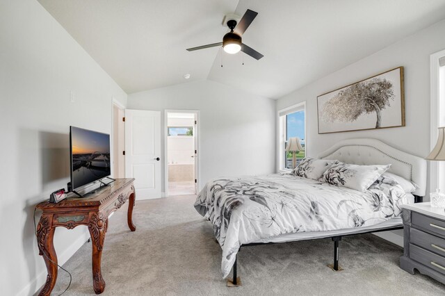 9867 Kahler Ave NE, Monticello, MN 55362 - bedroom featuring lofted ceiling, carpet, ensuite bathroom, baseboards, and a ceiling fan