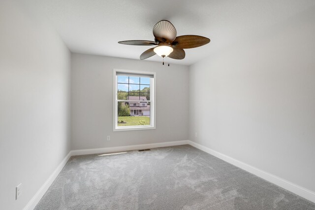 9867 Kahler Ave NE, Monticello, MN 55362 - carpeted spare room featuring ceiling fan and baseboards