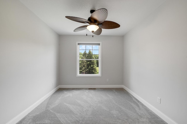 9867 Kahler Ave NE, Monticello, MN 55362 - empty room with carpet floors, a ceiling fan, and baseboards