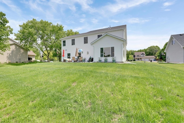9867 Kahler Ave NE, Monticello, MN 55362 - back of property featuring a yard