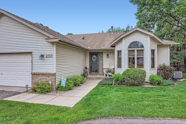 11760 88th Pl N, Maple Grove, MN 55369 - ranch-style house with a front lawn, a garage, and roof with shingles