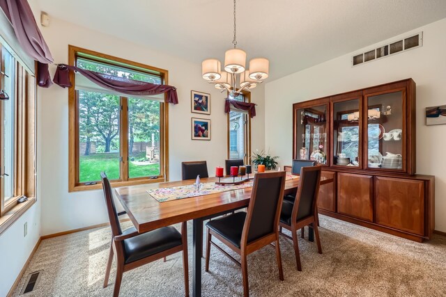 11760 88th Pl N, Maple Grove, MN 55369 - dining room featuring a chandelier and carpet floors