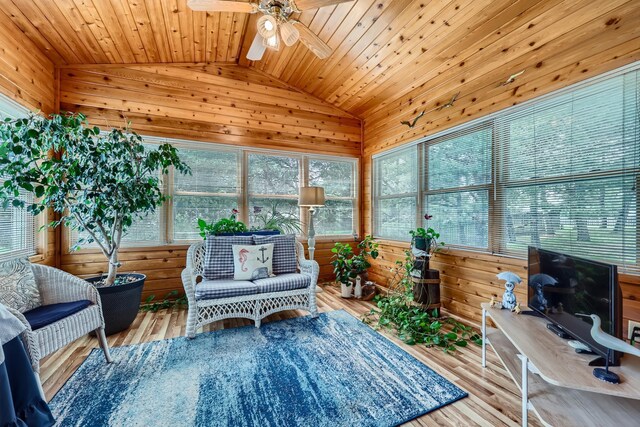 11760 88th Pl N, Maple Grove, MN 55369 - sunroom featuring lofted ceiling, a ceiling fan, wooden walls, a wooden deck, and wood finished floors