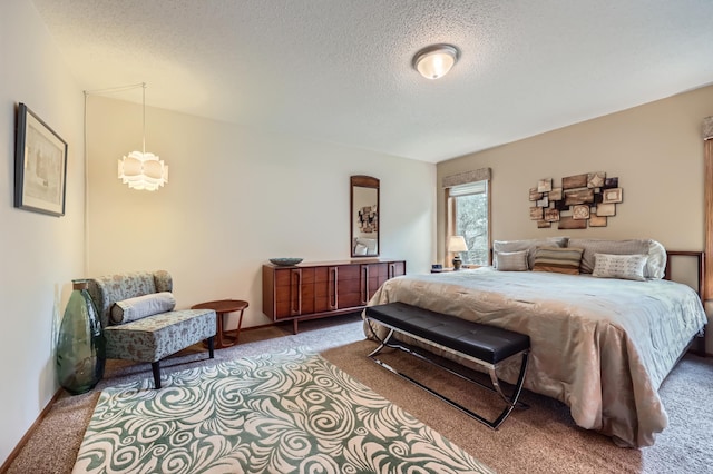 11760 88th Pl N, Maple Grove, MN 55369 - bedroom with carpet, a textured ceiling, and a chandelier