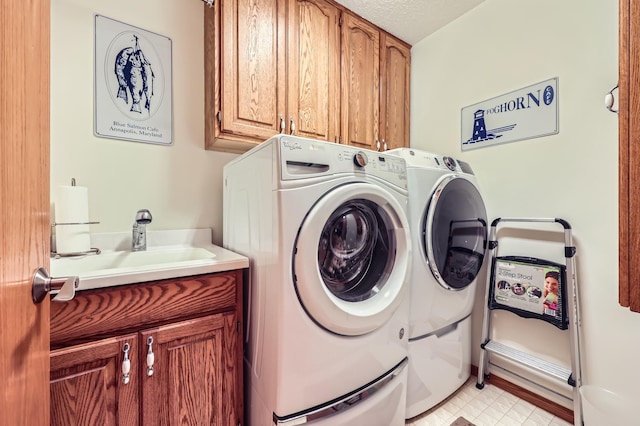 11760 88th Pl N, Maple Grove, MN 55369 - washroom featuring cabinet space and washer and clothes dryer