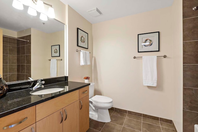 215 10th Ave S Unit 425, Minneapolis, MN 55415 - full bathroom featuring tile patterned flooring, vanity, and tiled shower