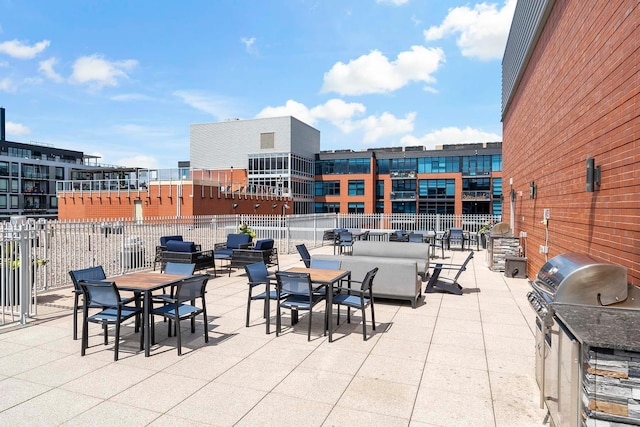 215 10th Ave S Unit 425, Minneapolis, MN 55415 - view of patio / terrace featuring an outdoor kitchen