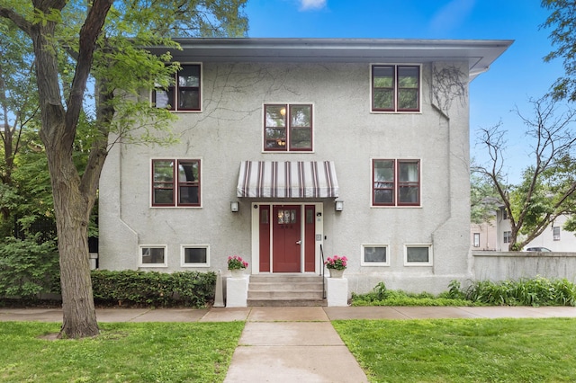 666 Ashland Ave Unit 5, Saint Paul, MN 55104 - raised ranch featuring stucco siding
