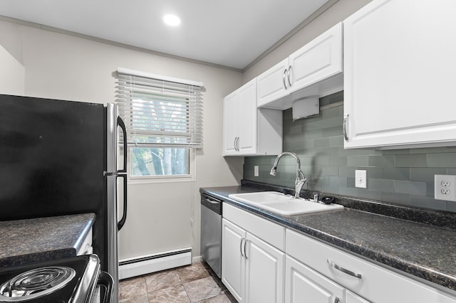 666 Ashland Ave Unit 5, Saint Paul, MN 55104 - kitchen with a baseboard heating unit, appliances with stainless steel finishes, dark countertops, white cabinets, and tasteful backsplash
