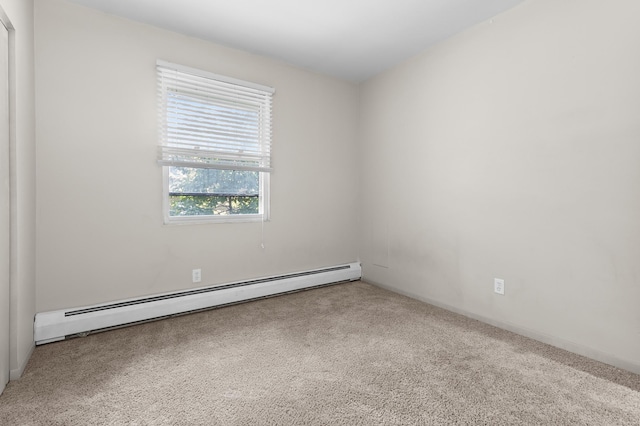 666 Ashland Ave Unit 5, Saint Paul, MN 55104 - unfurnished room with a baseboard heating unit and carpet floors