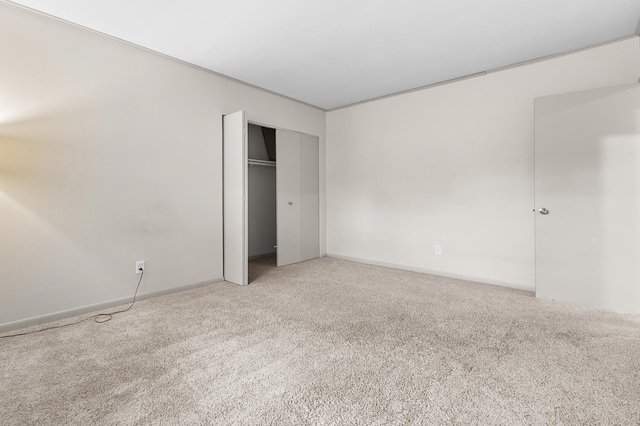 666 Ashland Ave Unit 5, Saint Paul, MN 55104 - unfurnished bedroom with carpet floors and a closet