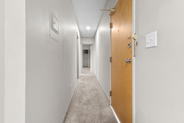 666 Ashland Ave Unit 5, Saint Paul, MN 55104 - hallway featuring light colored carpet, attic access, and recessed lighting