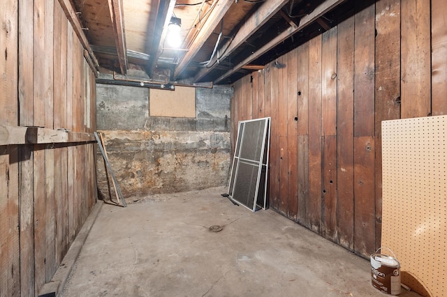 666 Ashland Ave Unit 5, Saint Paul, MN 55104 - unfinished basement featuring wood walls