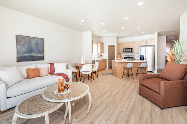 1600 5th Ave NE, Dilworth, MN 56529 - living area with light wood-type flooring and recessed lighting