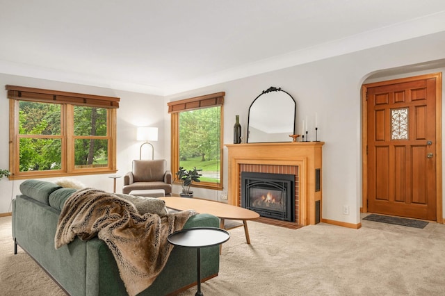 4313 Arthur St NE, Columbia Heights, MN 55421 - living area with carpet floors, a brick fireplace, and baseboards