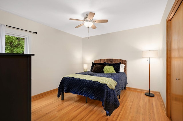 4313 Arthur St NE, Columbia Heights, MN 55421 - bedroom with light wood-style floors, baseboards, and ceiling fan