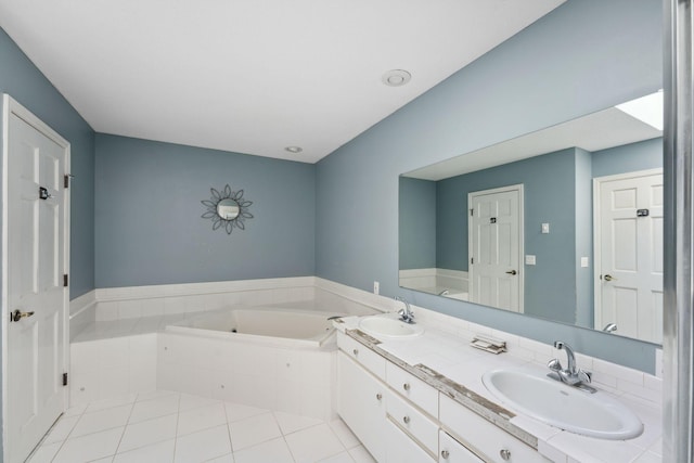 13914 Duluth Dr, Apple Valley, MN 55124 - bathroom featuring a garden tub, double vanity, and tile patterned floors