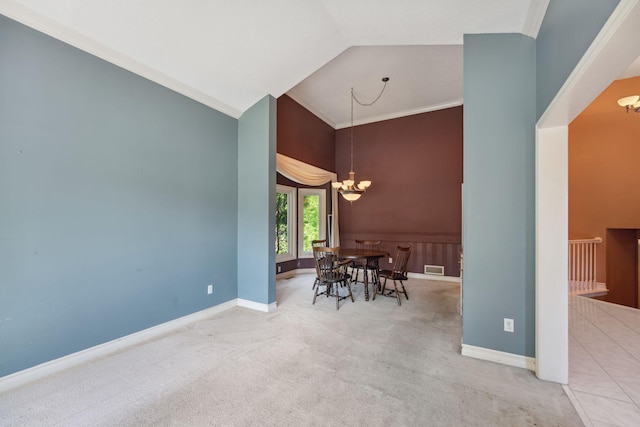 13914 Duluth Dr, Apple Valley, MN 55124 - dining area featuring a chandelier, ornamental molding, carpet flooring, and high vaulted ceiling