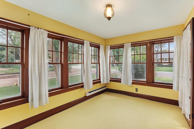 1206 2nd St W, Hastings, MN 55033 - unfurnished sunroom featuring a baseboard heating unit