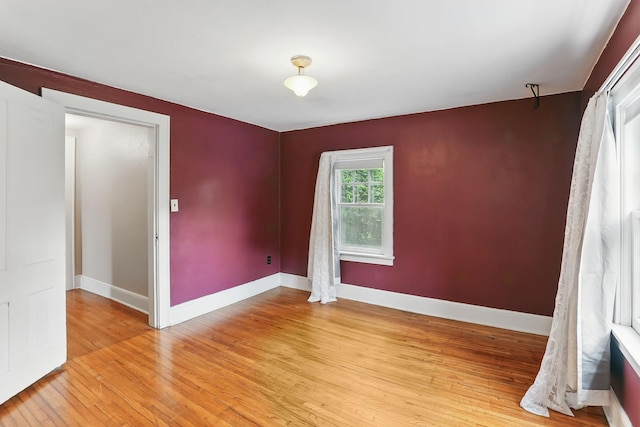 1206 2nd St W, Hastings, MN 55033 - empty room with light wood finished floors and baseboards