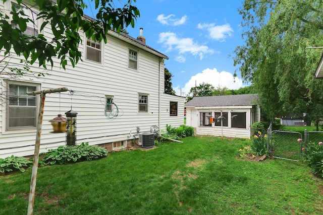 1206 2nd St W, Hastings, MN 55033 - back of property with central air condition unit and a chimney