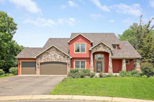 904 Ridgecrest Dr, Carver, MN 55315 - craftsman inspired home featuring stone siding, driveway, a front yard, a garage, and roof with shingles