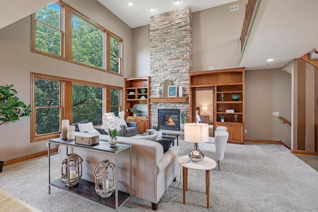 904 Ridgecrest Dr, Carver, MN 55315 - living area with high vaulted ceiling, a fireplace, recessed lighting, and wood finished floors
