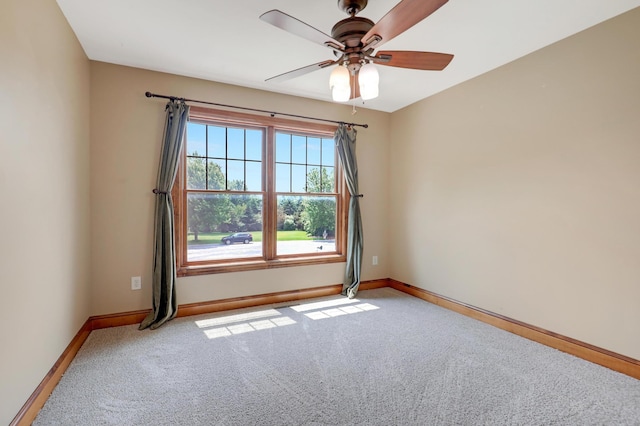 904 Ridgecrest Dr, Carver, MN 55315 - carpeted empty room featuring baseboards and ceiling fan