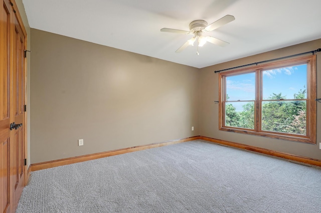 904 Ridgecrest Dr, Carver, MN 55315 - carpeted spare room featuring baseboards and ceiling fan