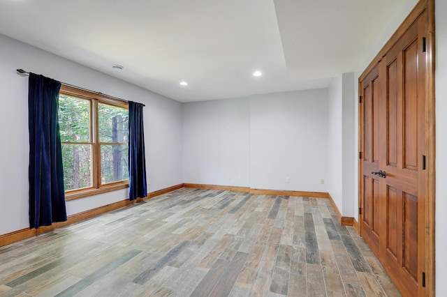 904 Ridgecrest Dr, Carver, MN 55315 - empty room featuring recessed lighting and light wood-style flooring