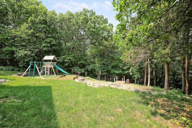 904 Ridgecrest Dr, Carver, MN 55315 - view of green lawn featuring a playground