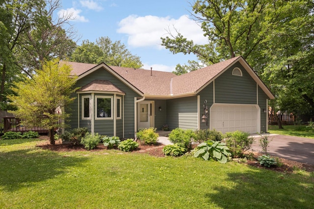 2745 Maplewood Cir, Monticello, MN 55362 - view of front facade with driveway, a garage, and a shingled roof