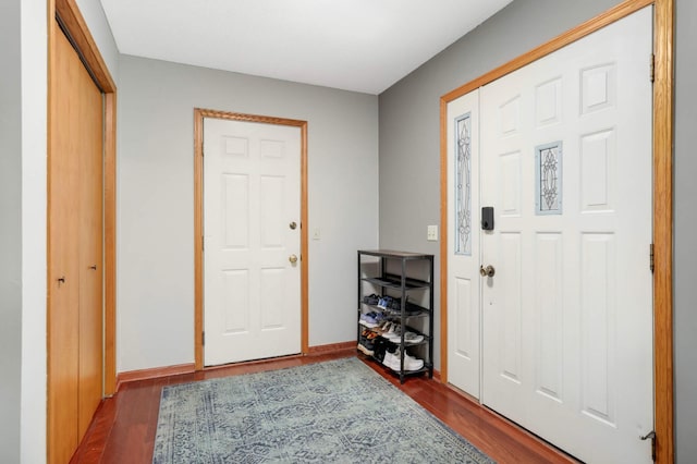 2745 Maplewood Cir, Monticello, MN 55362 - foyer featuring dark wood-style flooring and baseboards