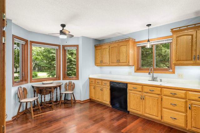 2745 Maplewood Cir, Monticello, MN 55362 - kitchen with dishwasher, a sink, a ceiling fan, light countertops, and dark wood-style floors